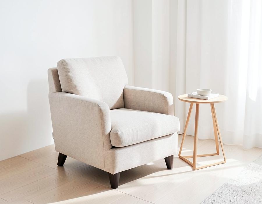 Clean fabric armchair in a bright living room
